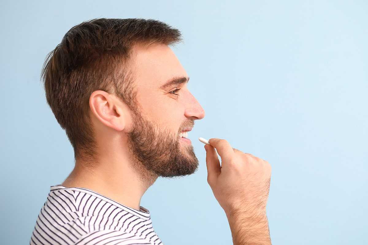 Does Chewing Hard Gum Really Improve Your Jawline? The Risks Explained